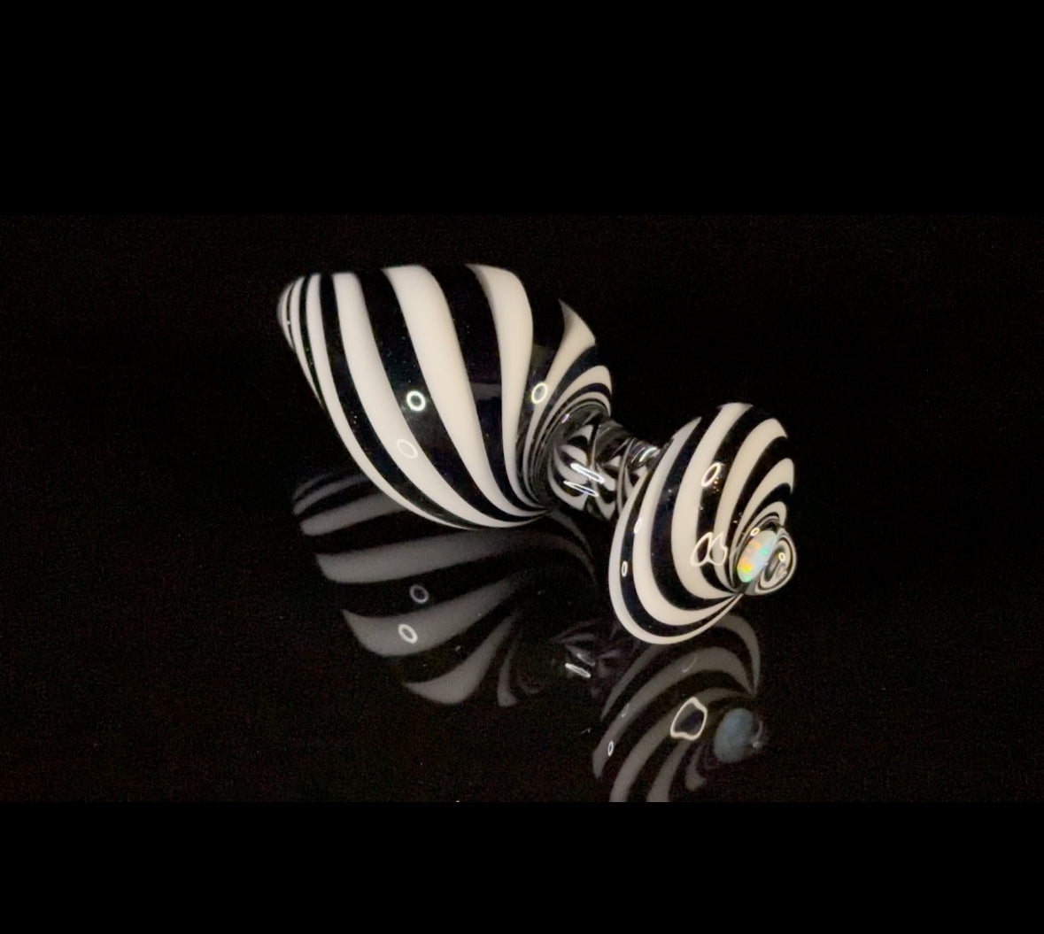 Black, white and opal plug