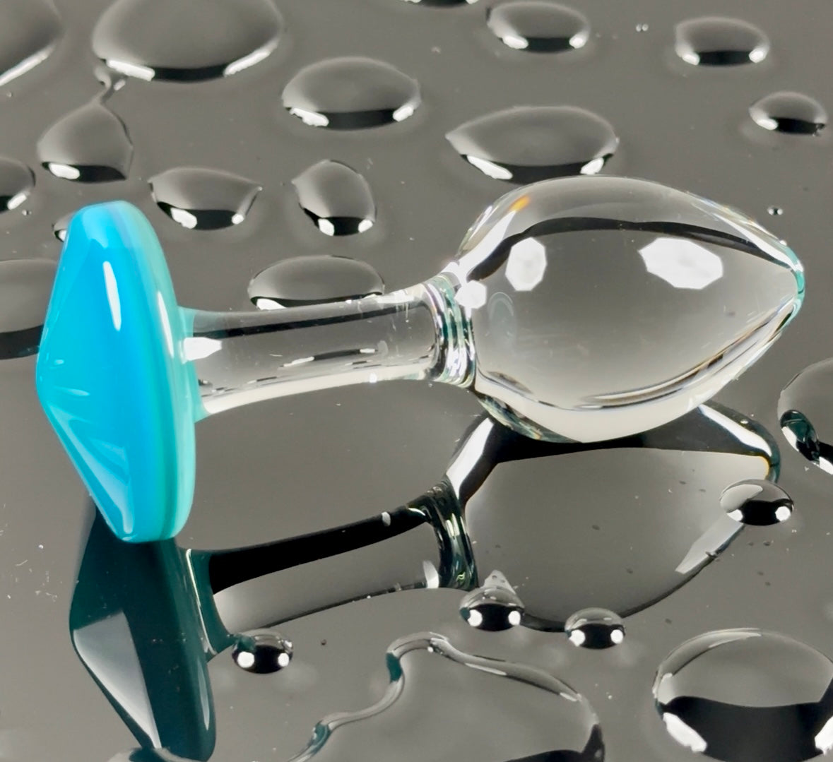 Aqua blue base and clear head plug