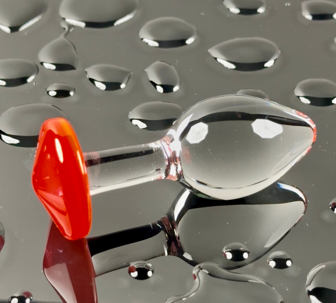 Orange Ruby base and clear head plug