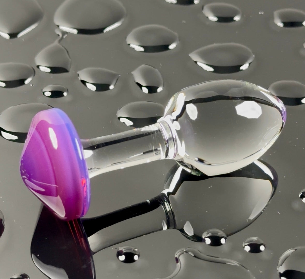 Royal purple base and clear head plug