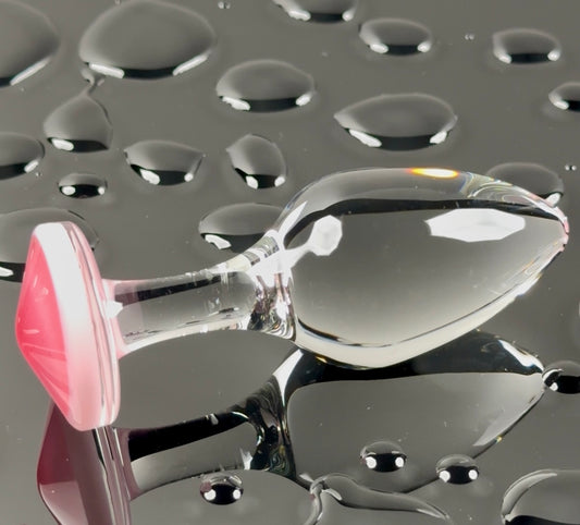 Pink base and clear head plug