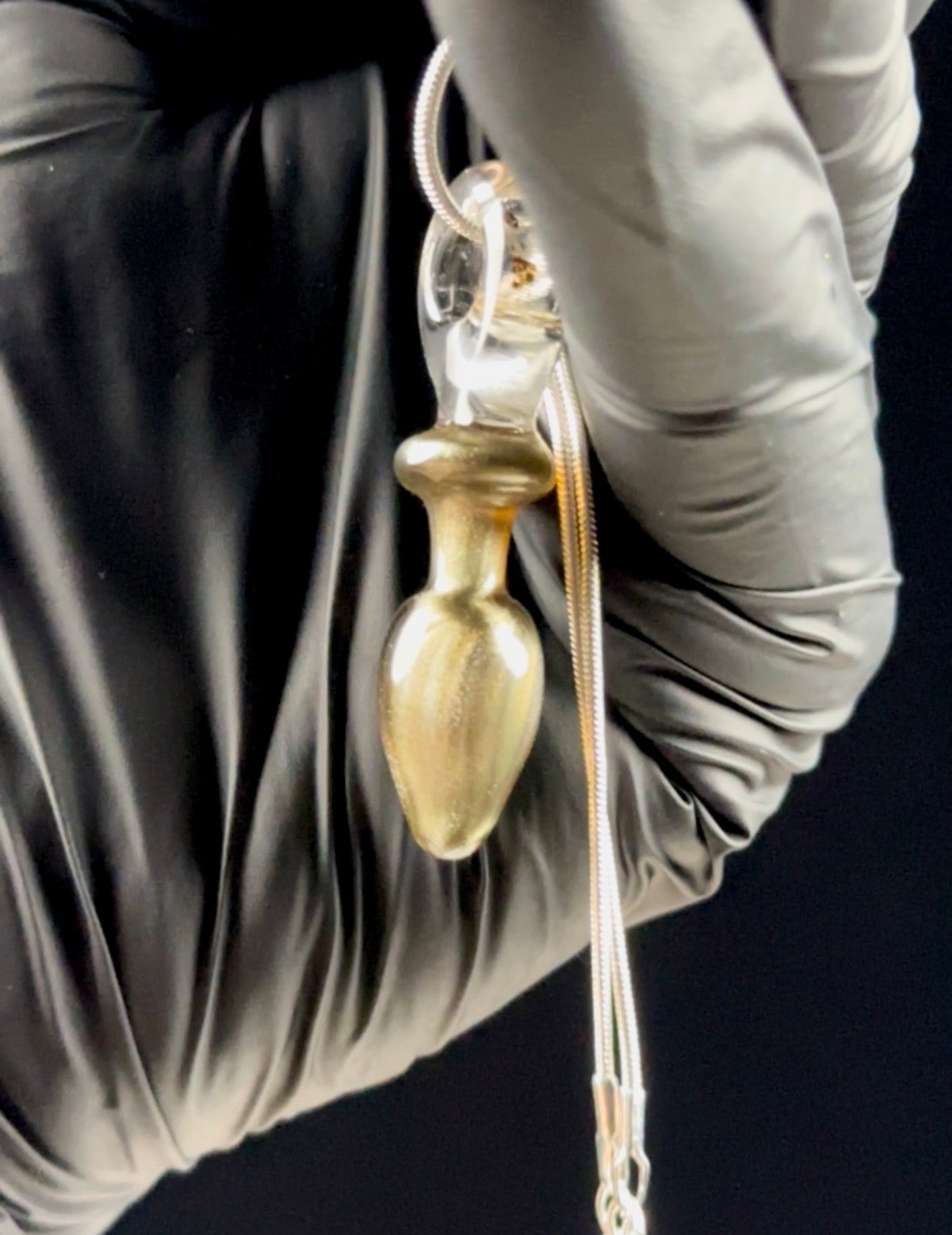 Sparkly gold plug pendant