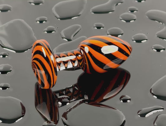 Black sparkle and orange plug